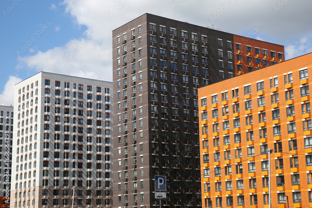 Obraz premium Facades of houses in the new microdistrict called Buninskie Lugy (