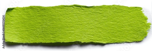 A bright lime green torn piece of paper