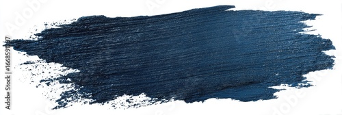 A textured, dark-blue paint swatch, roughly applied, shows a gradient from slightly lighter to darker shades across its length, with irregular, slightly frayed edges