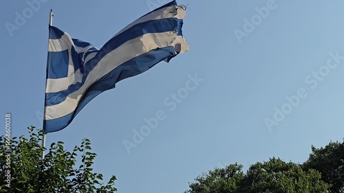 Greek Flag Waving in the Wind on a Sunny Day