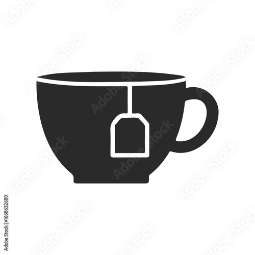 Silhouette of tea cup with teabag icon in black and white design