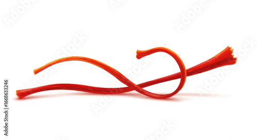 Single Red Saffron Stigma Isolated on White.