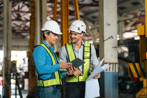 Engineers wearing safety he...