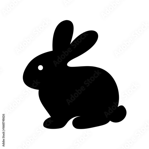 A minimalist and elegant black silhouette of a sitting rabbit or bunny