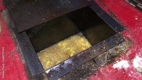 Dirty industrial floor hatch