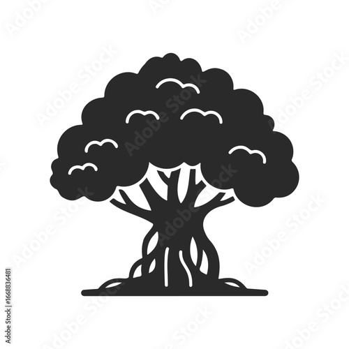 Silhouette of a large tree with dense canopy and branches