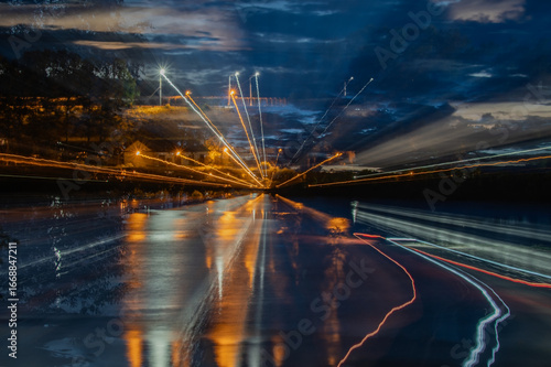 Abstract pattern of strands of lights in multi-coloured tones as fantastic background.