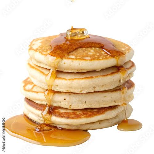 A stack of fluffy pancakes with maple syrup isolated on a transparent background