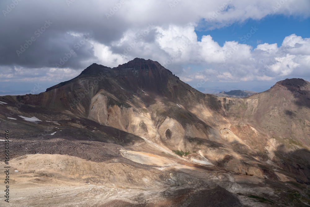 Naklejka premium Volcanic Mountain Landscape with Dramatic Colors and Textures