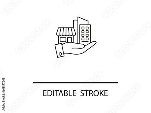 Secure business growth and investment opportunities symbolized by a hand holding buildings and shops.
