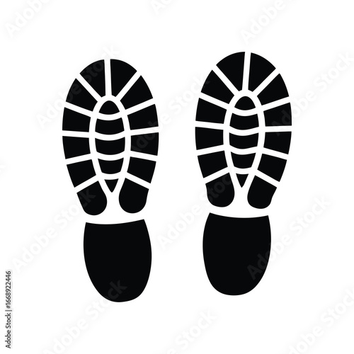 silhouette of two shoe footprints side by side 