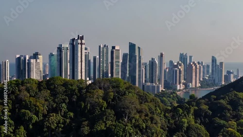Vista of the Littoral Rain Woodlands and the Historical Ancon Hill at the Access of the Interoceanic Passage on the Pacific Side, with the Skyline of the Contemporary Metropolis in the Distance
