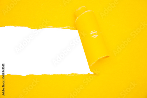 The missing message. Yellow paper torn in half in a strip from the middle.