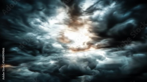 Dark, swirling cloudscape with hints of light peeking through dense, ominous formations