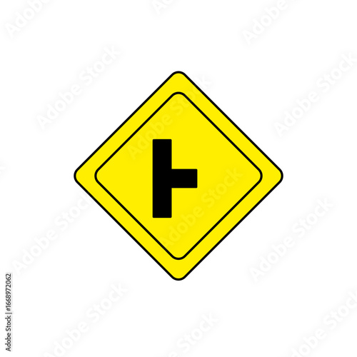 Yellow warning traffic sign in diamond shape indicating a side road enters from the left. Informs drivers about potential merging traffic or left-side entry