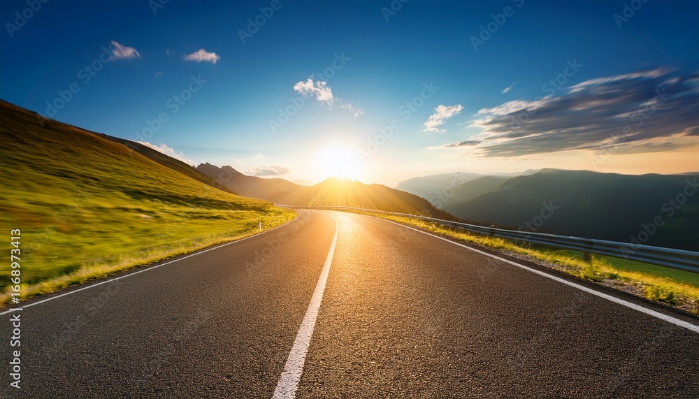 Naklejka premium long empty mountain road under a bright sunset on a sunny summer day with a speed motion blur effect ideal for a copy space image