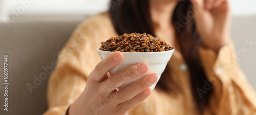 Young woman with fried inse...