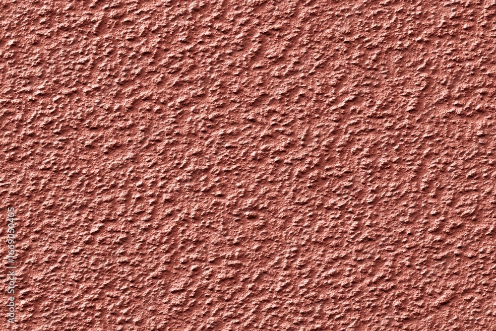 Fototapeta premium Textured pink concrete surface with rough grainy finish