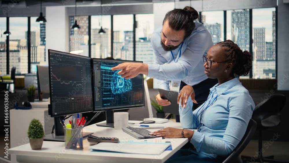 Fototapeta premium Teamworking proprietary firm colleagues using deep learning to assess stock market volatility. Brokerage company supervisor and african american woman using AI to generate investment reports