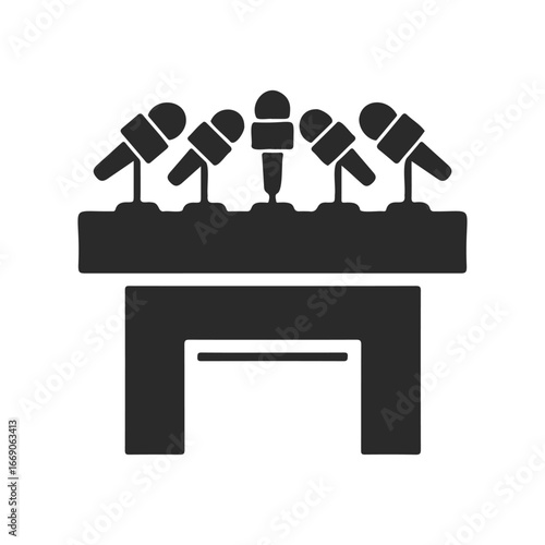 Silhouette of a microphone podium setup for press conference or public speaking event