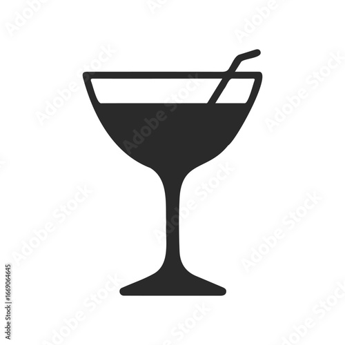 Silhouette of martini glass with straw on white background