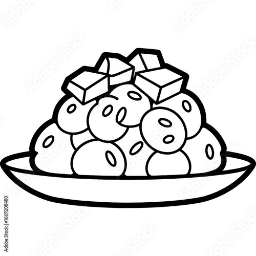 A bowl of beans and cubes with a white background