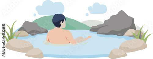 A man enjoying a peaceful moment while relaxing in a natural hot spring surrounded by lush greenery.
