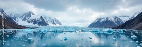 Wallpaper Mural Greenlands Dramatic Icy Landscape A Panoramic View of Vast Glaciers and Rugged Mountains Under a Breathtaking Winter Sky. Perfect for Travel, Nature, and Environmental Projects. Torontodigital.ca