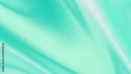 A smooth abstract motion background featuring flowing silk fabric with a teal gradient effect