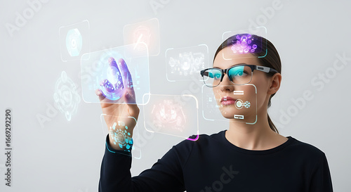Woman interacting with holographic display wearing glasses and a dark top in a futuristic setting