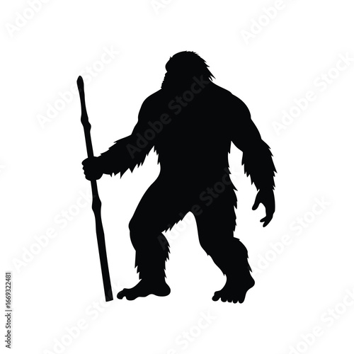 Black silhouette of a Bigfoot sasquatch holding a walking stick upright, bigfoot holding stick silhouette vector illustration