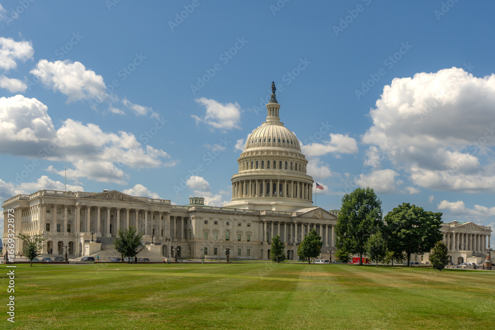 Fototapeta premium Washington DC. Capitol dome. Congress and Senate Capitol building in Washington D.C.. USA flag over Capitol dome. American Capitol. Congress and Senate in Washington D.C.