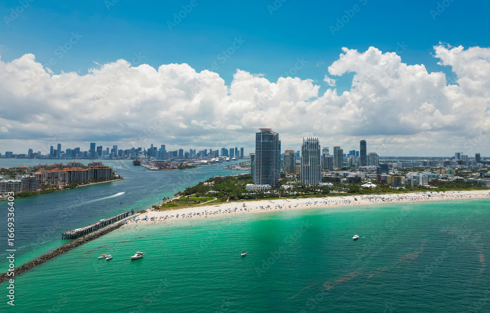 Obraz premium Aerial view of Miami skyline. Drone shot of Miami cityscape. Top view of South Miami and the ocean. Miami skyline with skyscrapers and coastline from above.