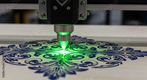 Laser engraving intricate floral design onto wood surface expertly