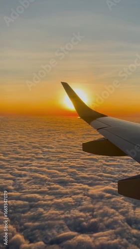 airplane in the sky at sunset