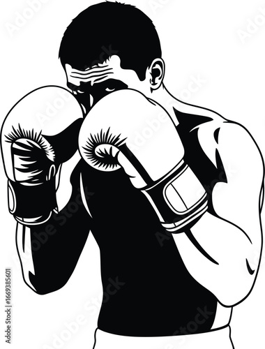 Powerful boxer wearing gloves in fighting stance ready for action and victory