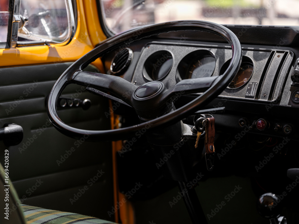 Fototapeta premium steering wheel detail of a vintage classic car