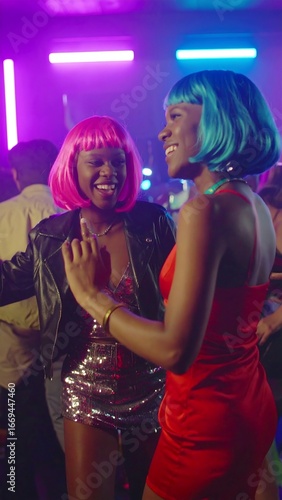 Two women dancing at a club