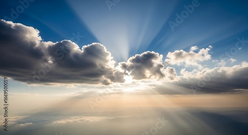 Sunbeams breaking through clouds, creating a divine light effect