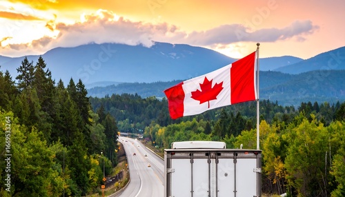 A scenic highway vista showcasing a Canadian flag flying high above a roadway nestled amidst a lush landscape of pine trees at golden hour.