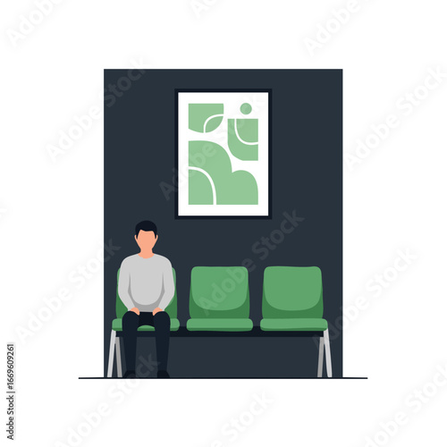 Man sitting patiently in modern waiting room with green chairs and abstract art.