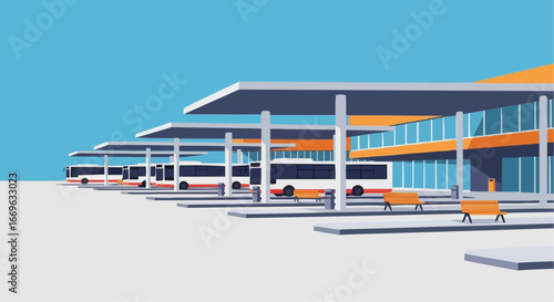 Modern bus station with multiple buses parked under a canopy.