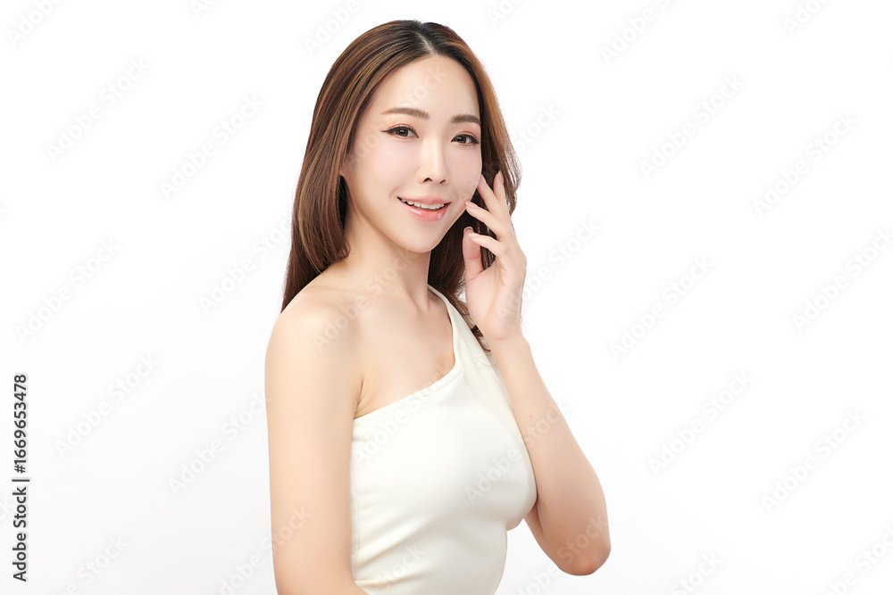 A beautiful young Asian woman with clean, fresh skin against a white background. Skincare, facial treatment, cosmetology, beauty, and spa. An elegant portrait of an Asian woman. A beautiful young Asian woman with clean, fresh skin against a white background. Skincare, facial treatment, cosmetology, beauty, and spa. An elegant portrait of an Asian woman.