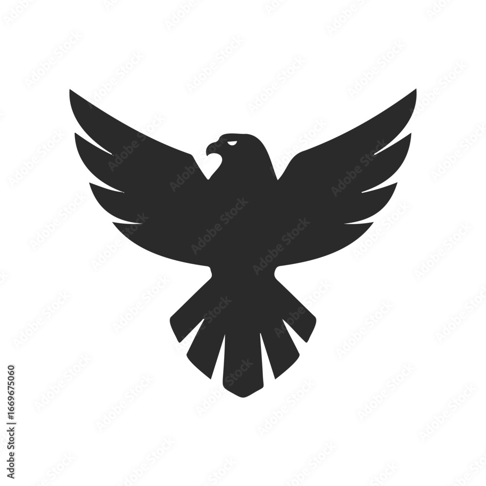 Obraz premium Black silhouette of a flying falcon with outstretched wings