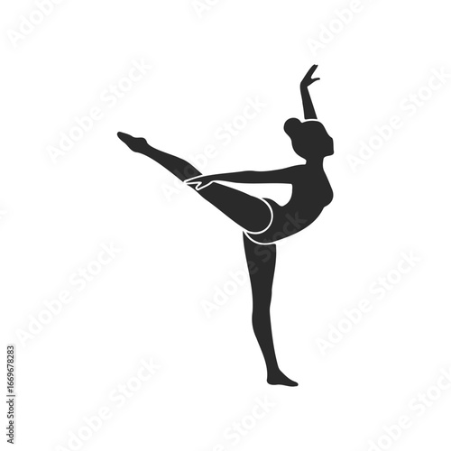 Silhouette of female ballerina in arabesque pose
