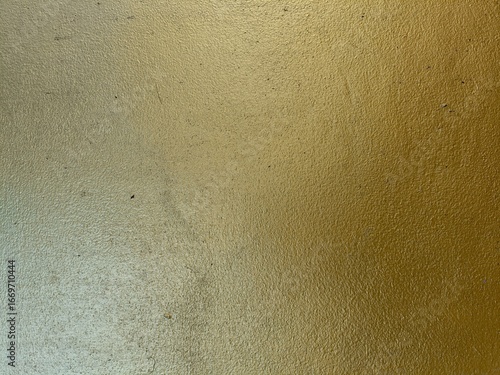 Golden cement wall texture background 