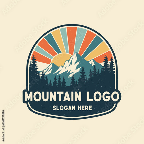 Retro mountain logo design featuring a sunburst, snow-capped peaks, and evergreen forest.