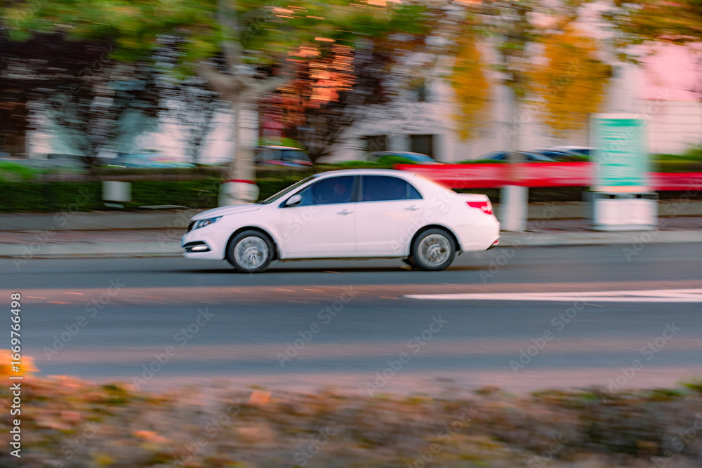 Fototapeta premium Various car landscapes running on city streets, with blurred backgrounds in motion