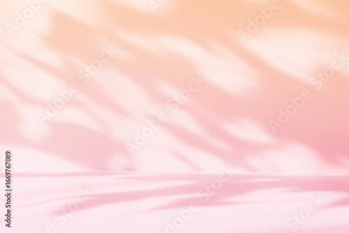 Abstract pink color gradient studio background for product presentation. Empty room with shadows of flowers and plant leaves. 3d orange room with copy space. Summer concept. Blurred backdrop