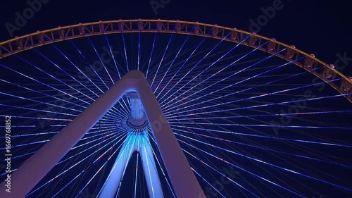 Ferris wheel illuminated at night